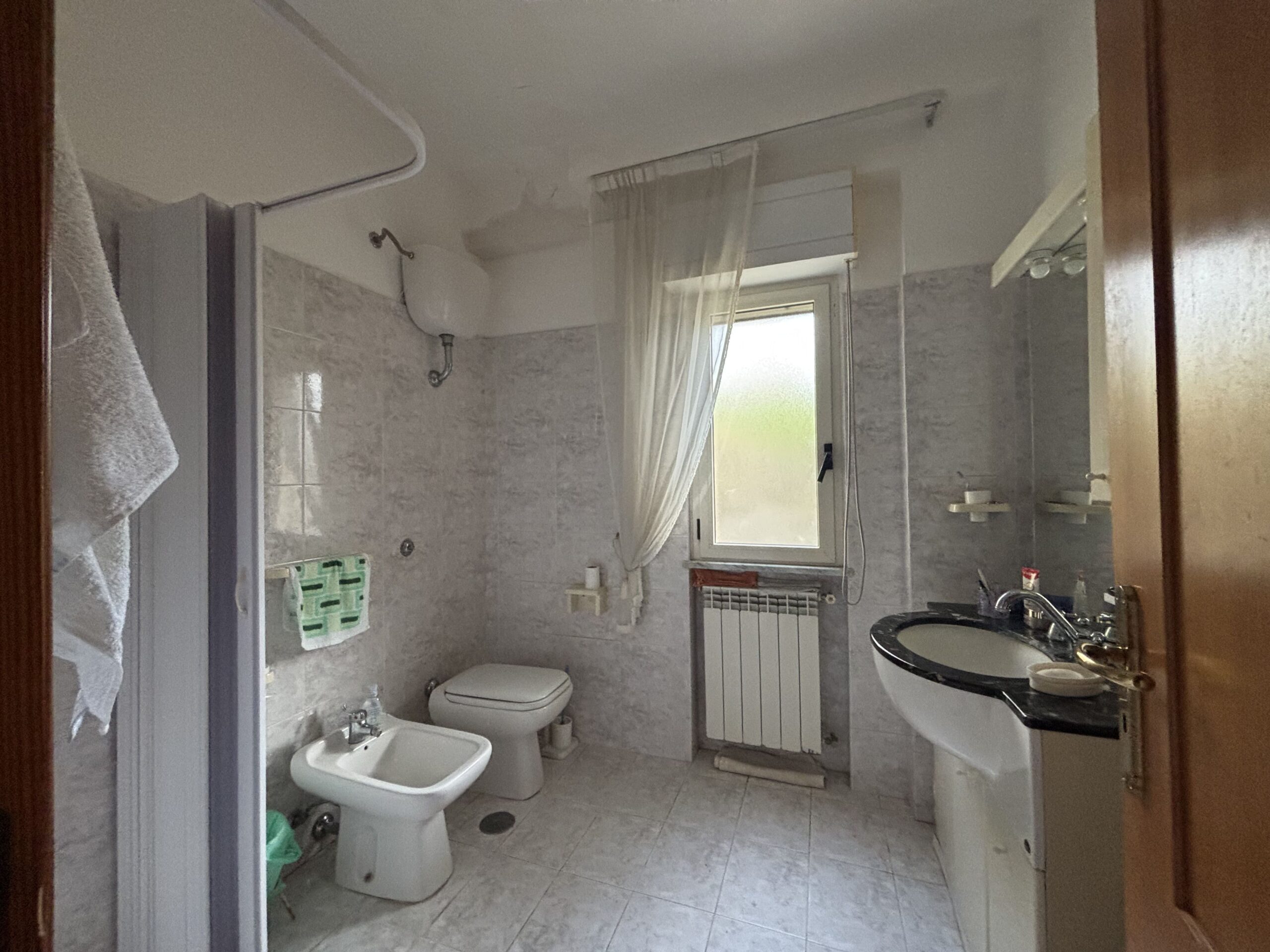 A flat with garden and garage on Parco Le Piramidi estate, Scalea.