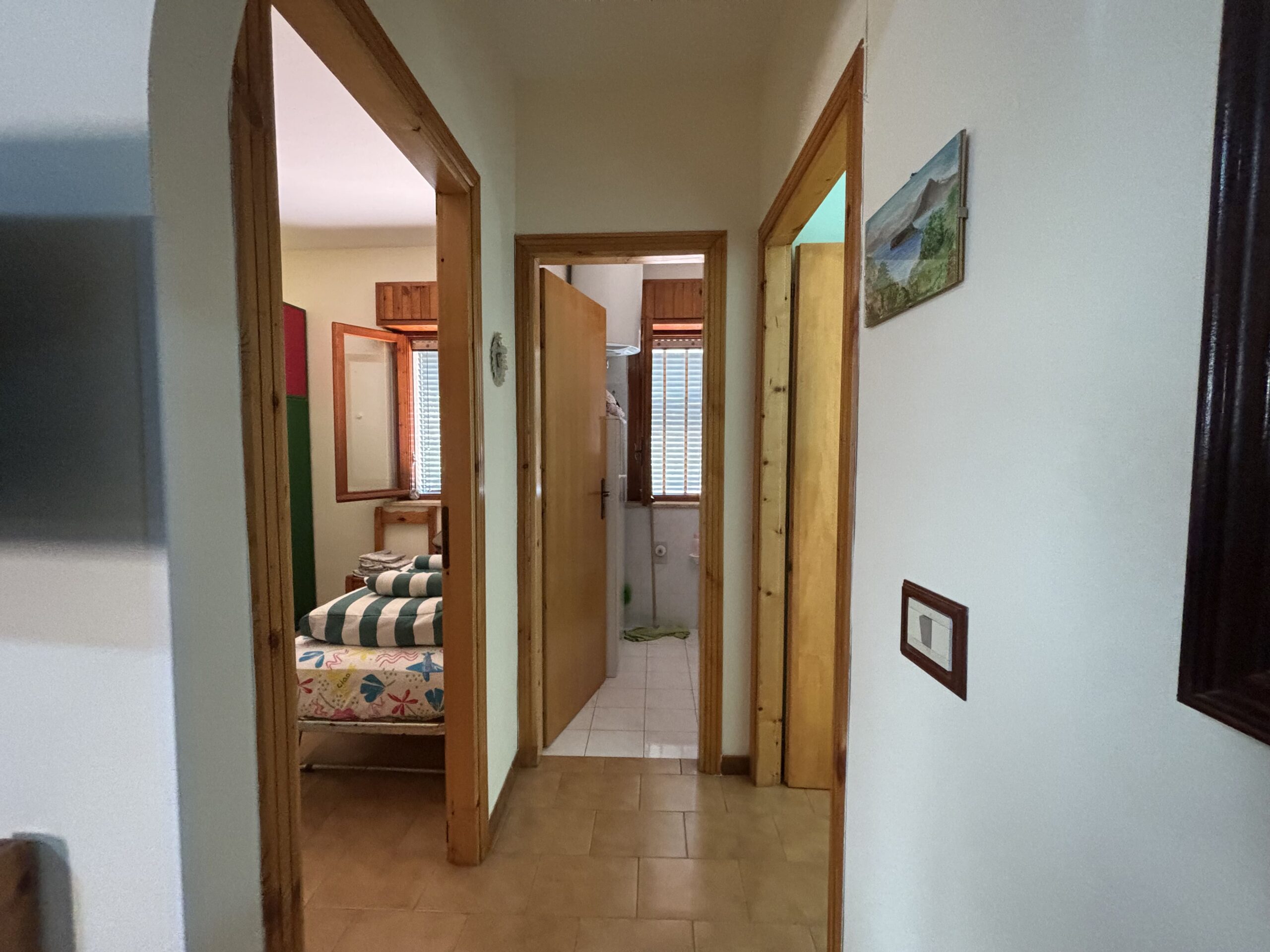 San Nicola Arcella - appartamento al piano terra con giardino, garage e posto auto.