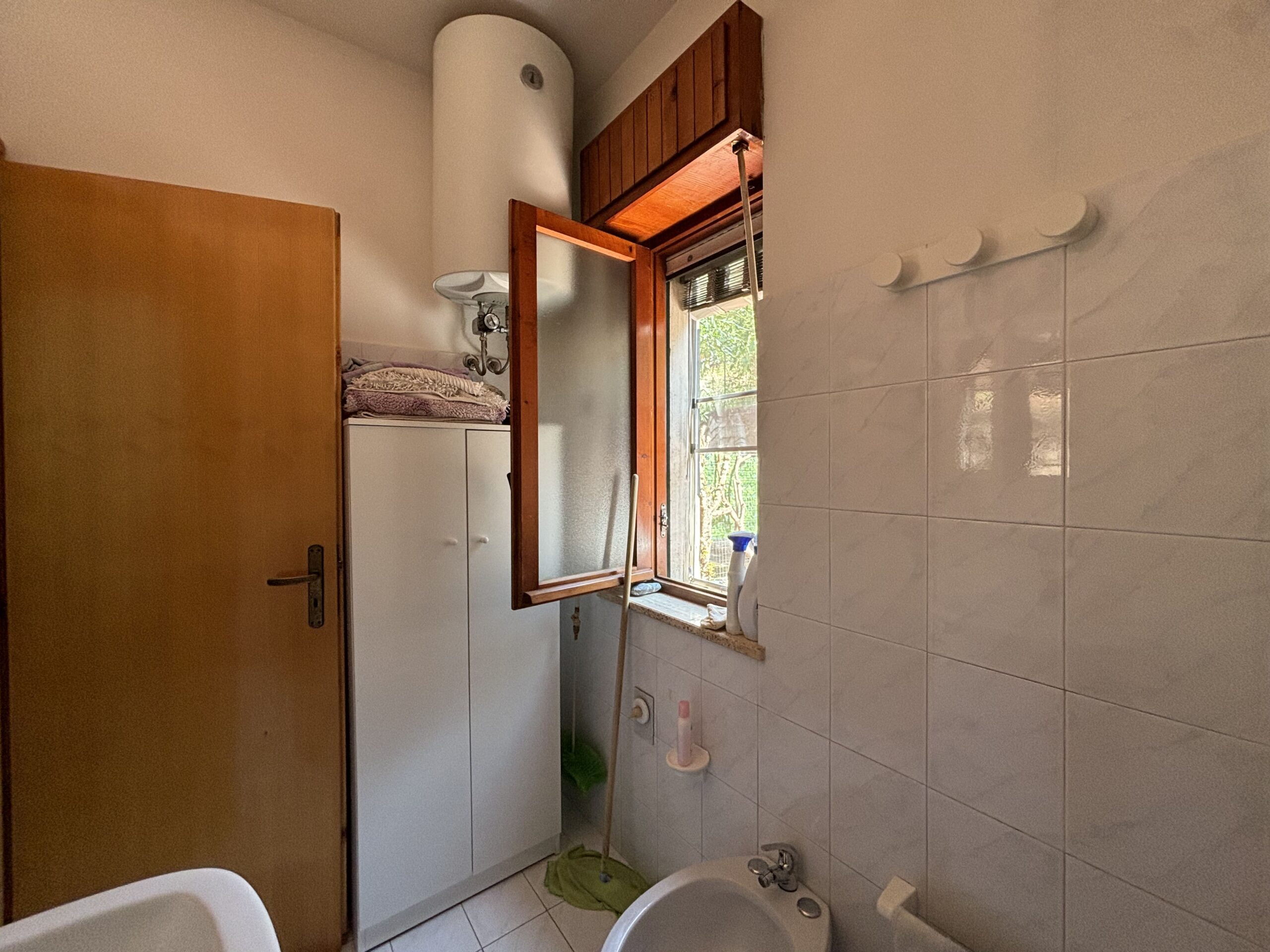 San Nicola Arcella - appartamento al piano terra con giardino, garage e posto auto.