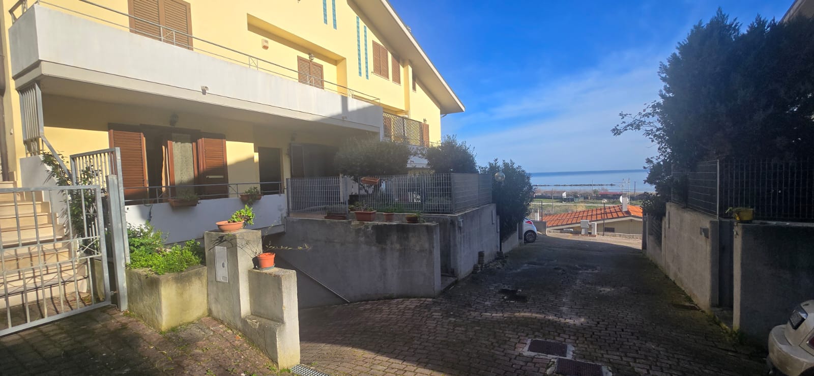 A terraced house just off the sea.