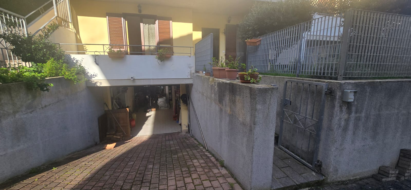 A terraced house just off the sea.