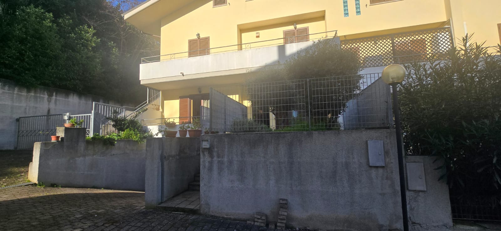 A terraced house just off the sea.