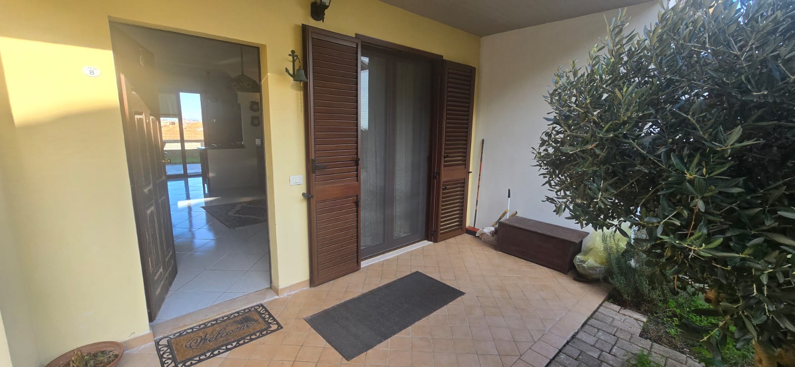 A terraced house just off the sea.