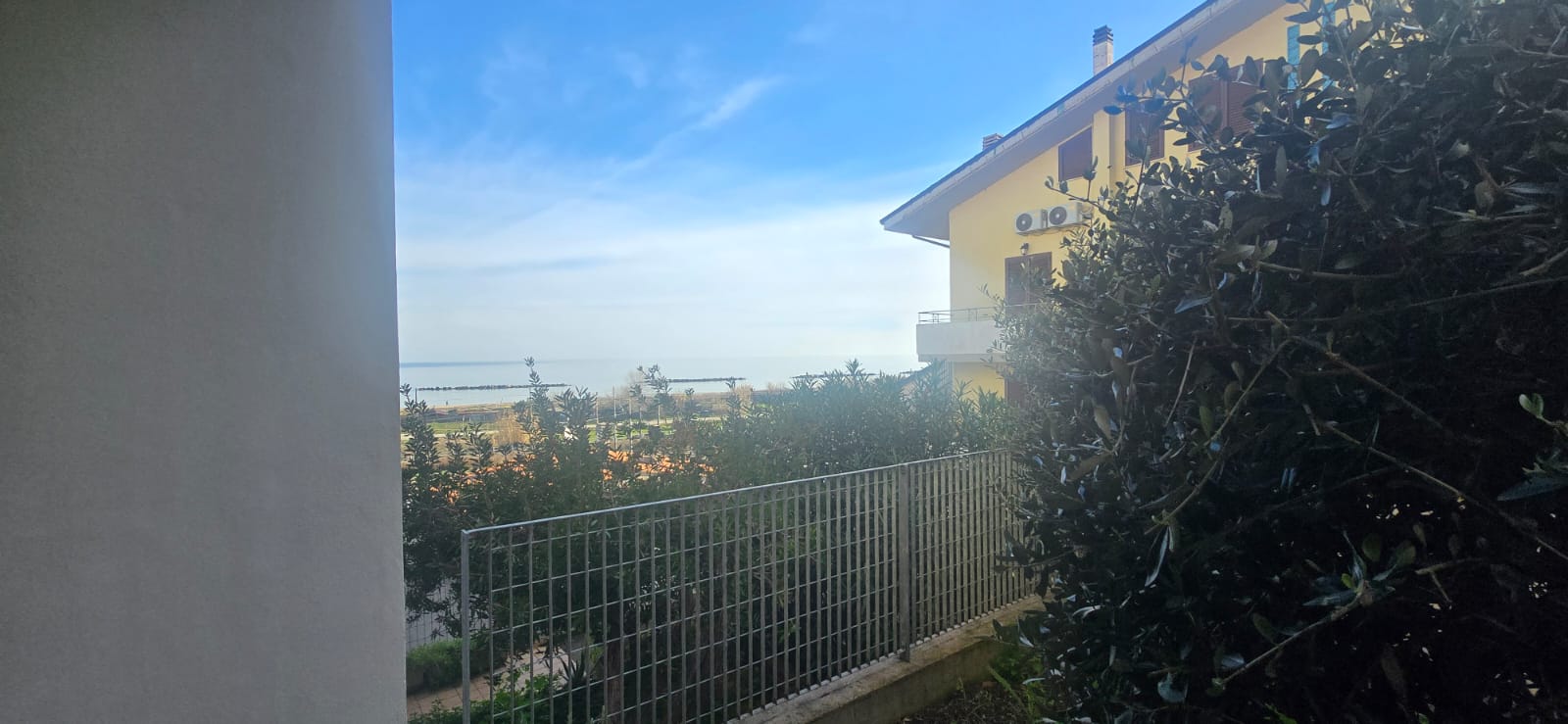 A terraced house just off the sea.