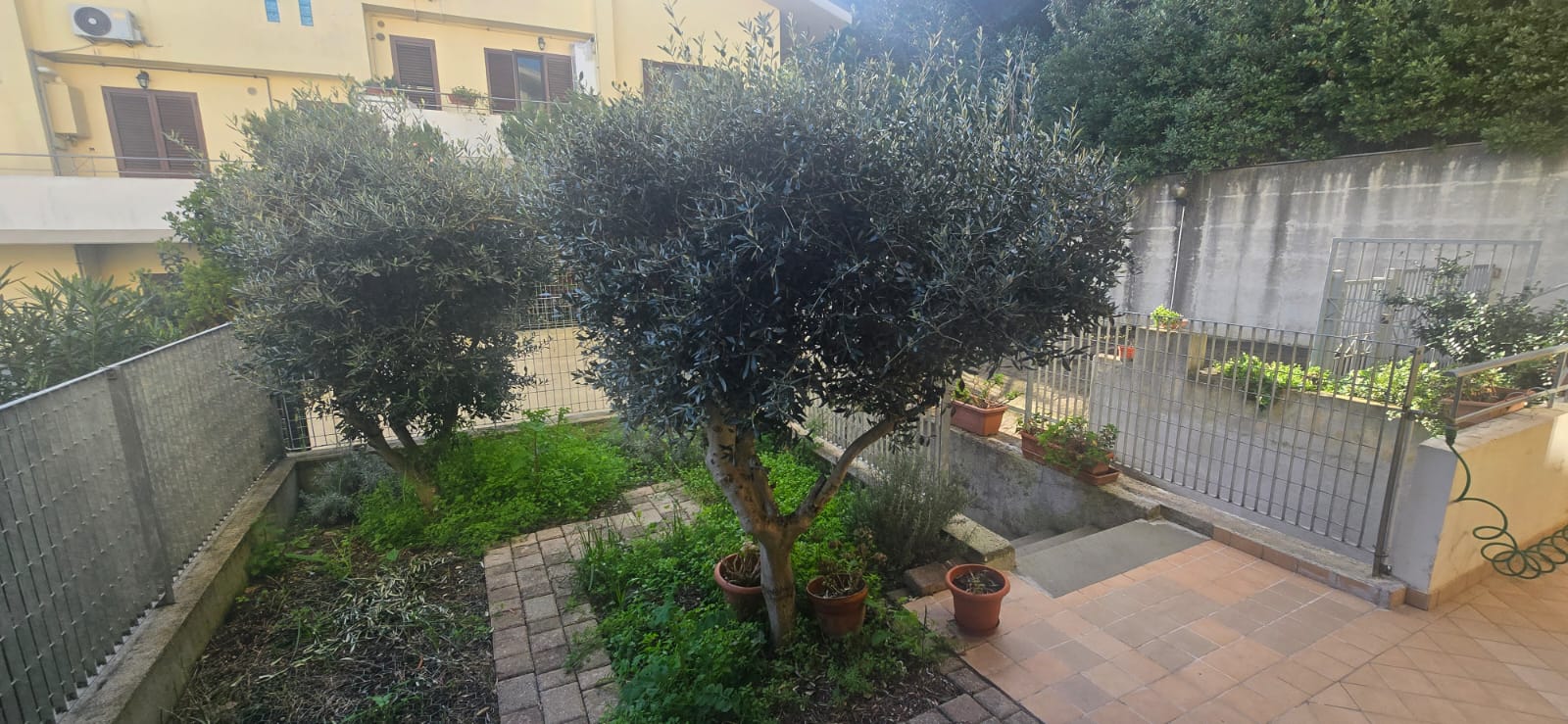 A terraced house just off the sea.