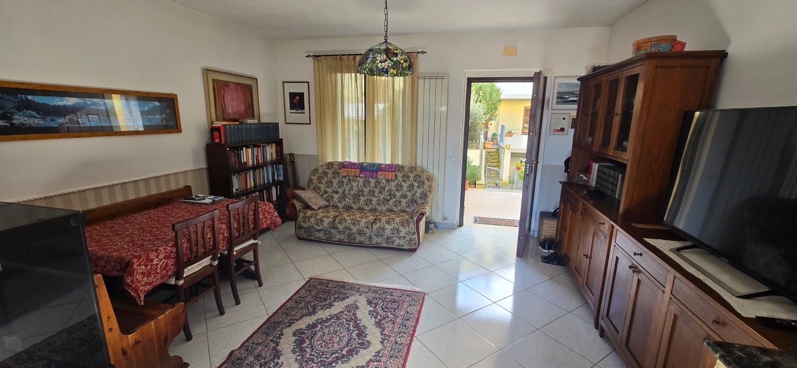 A terraced house just off the sea.