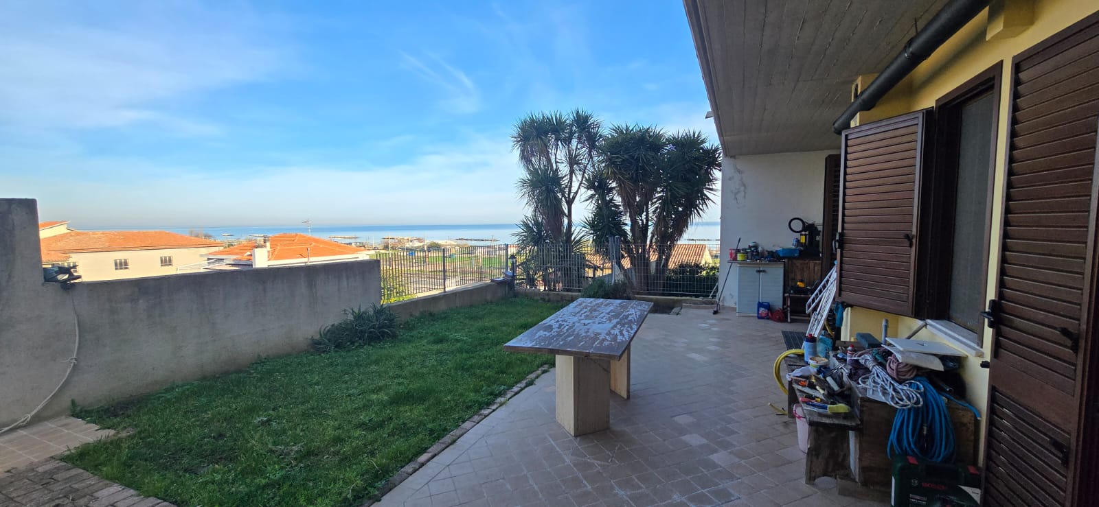 A terraced house just off the sea.
