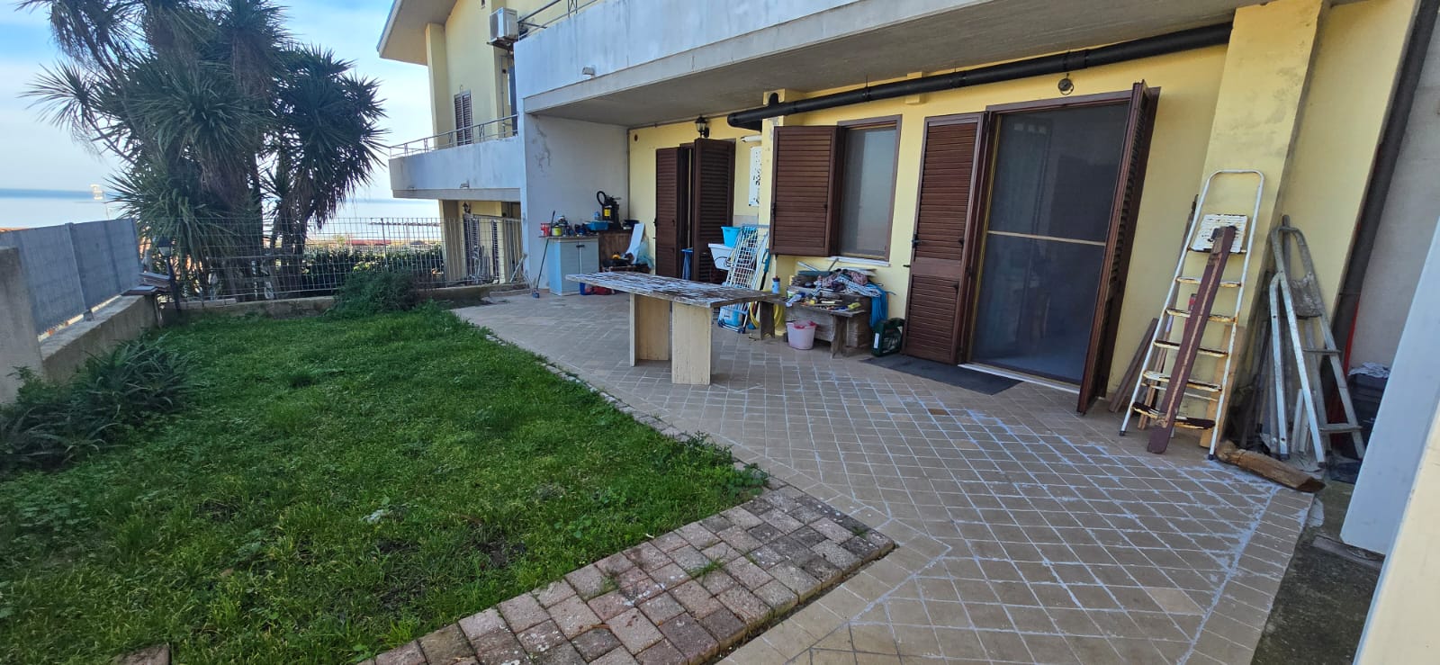 A terraced house just off the sea.