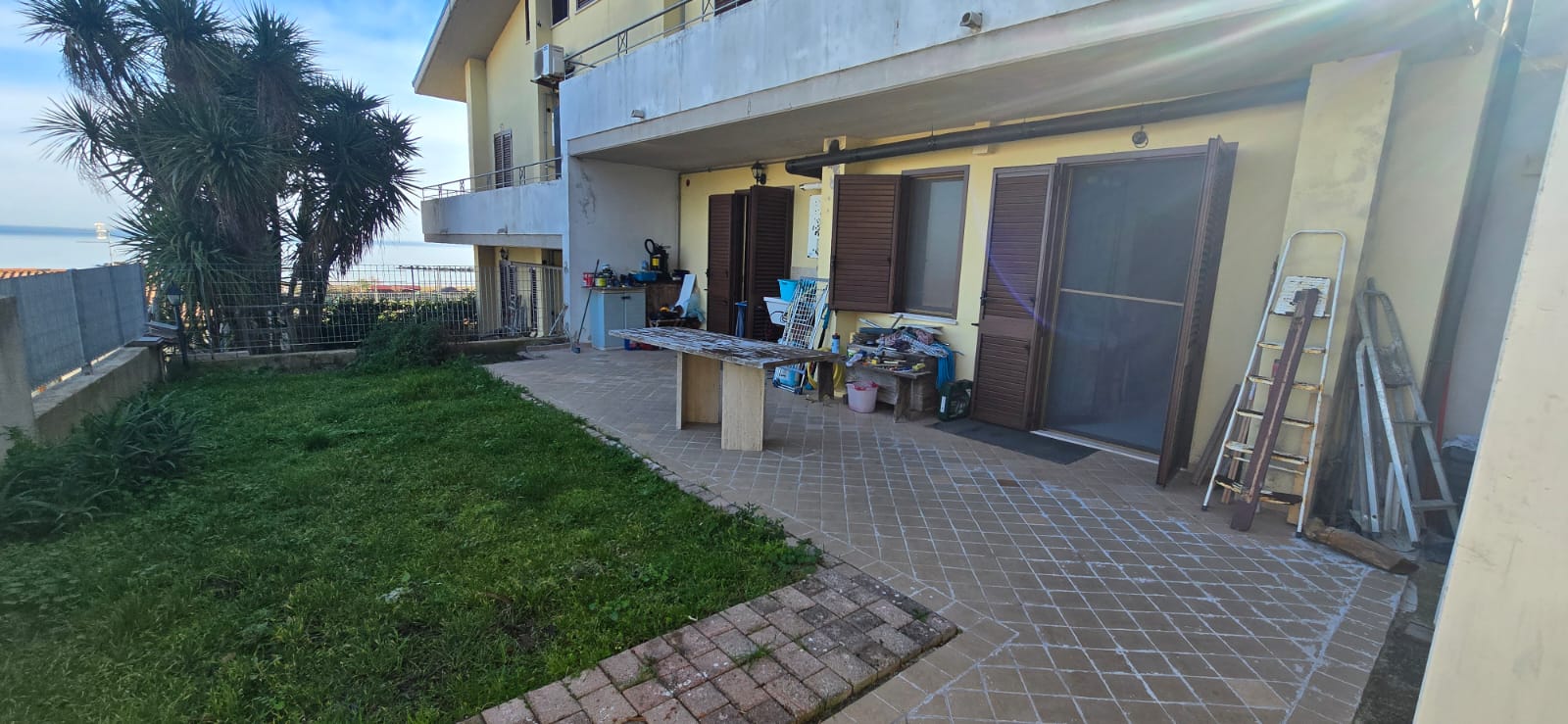 A terraced house just off the sea.