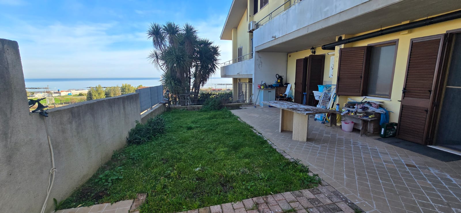 A terraced house just off the sea.