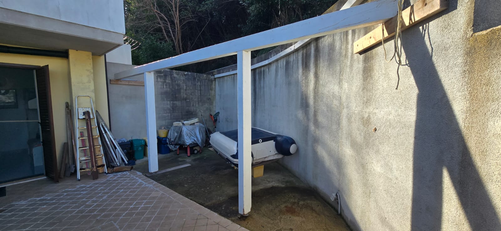 A terraced house just off the sea.