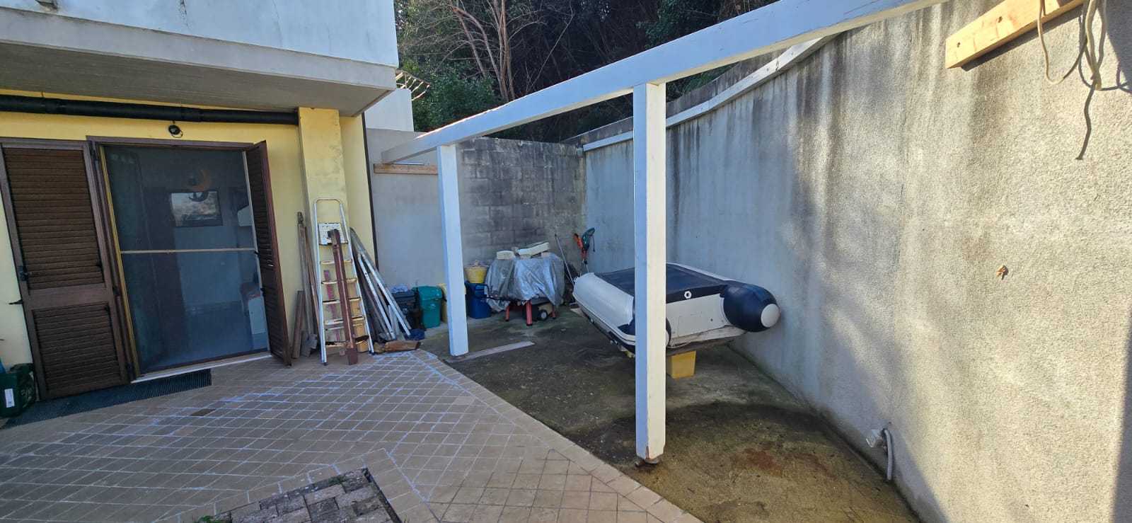 A terraced house just off the sea.