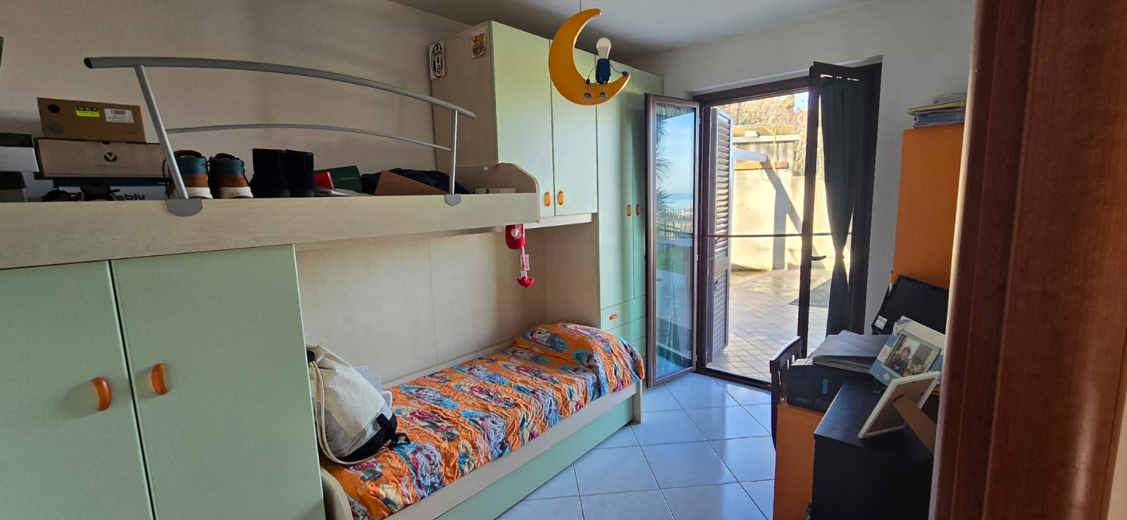 A terraced house just off the sea.