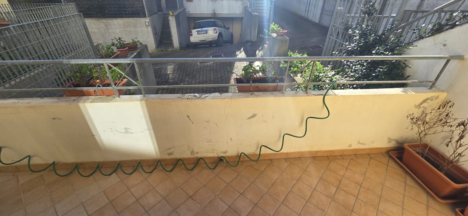 A terraced house just off the sea.