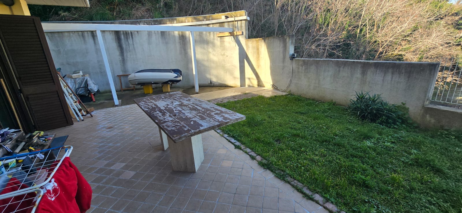 A terraced house just off the sea.
