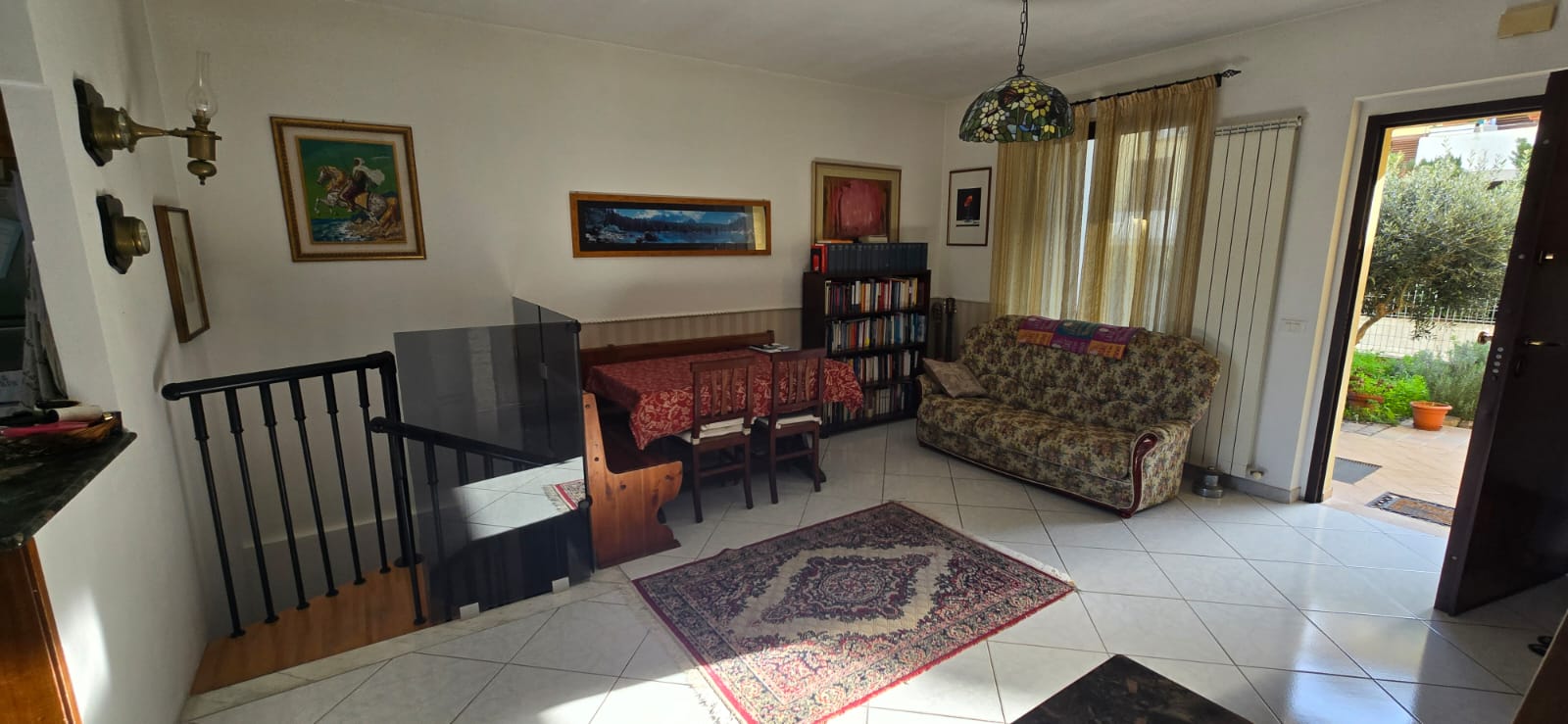 A terraced house just off the sea.