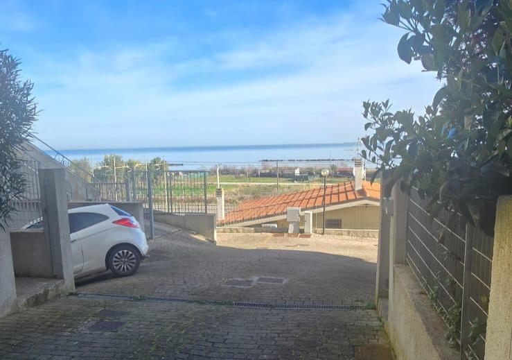 A terraced house just off the sea.