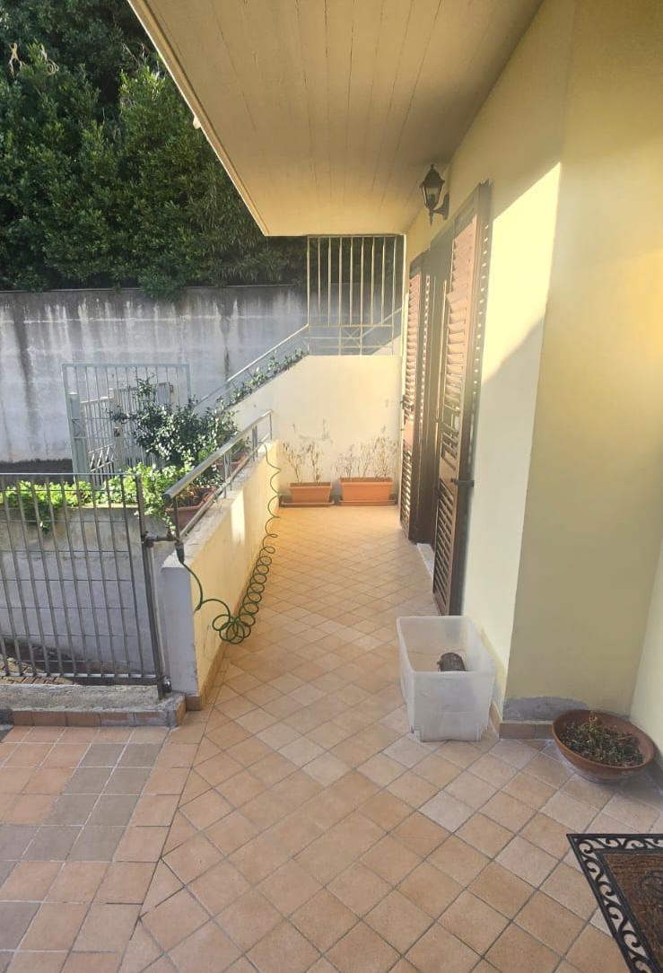 A terraced house just off the sea.