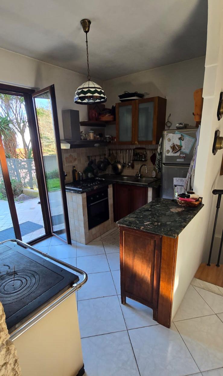 A terraced house just off the sea.