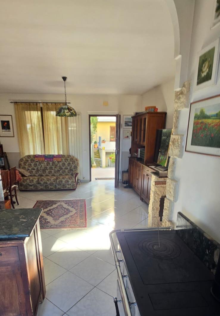 A terraced house just off the sea.