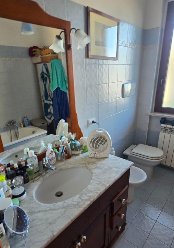 A terraced house just off the sea.