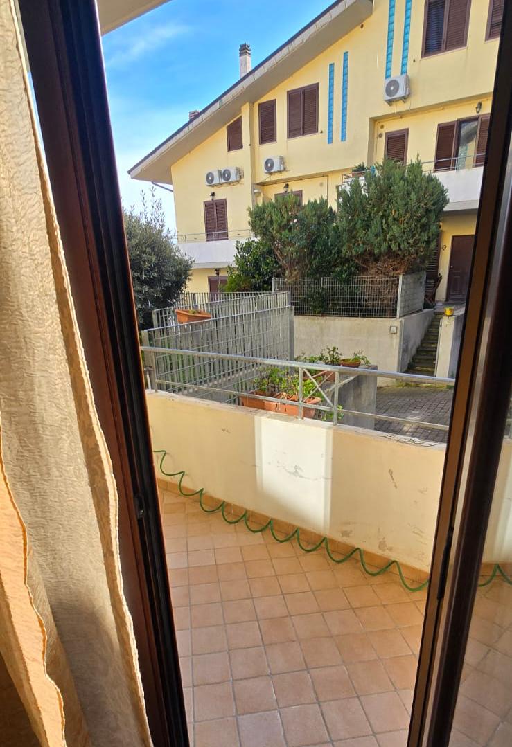 A terraced house just off the sea.