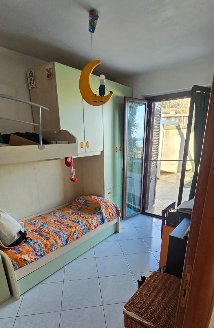 A terraced house just off the sea.