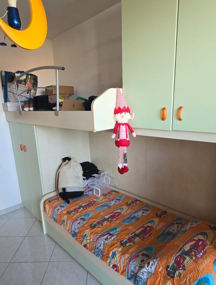 A terraced house just off the sea.