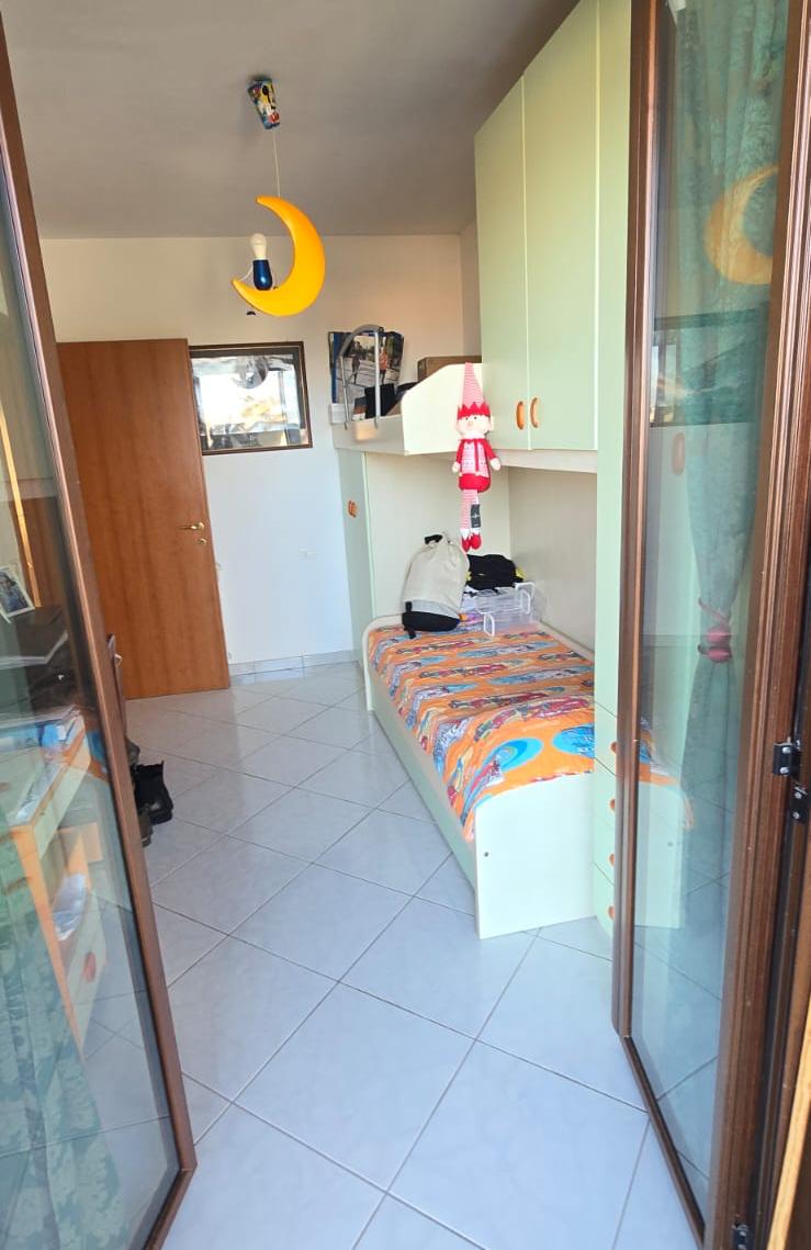 A terraced house just off the sea.