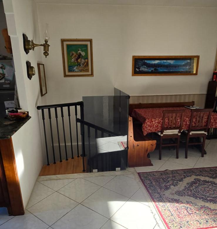 A terraced house just off the sea.