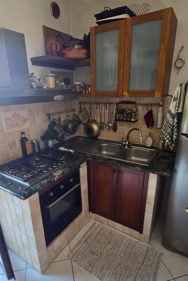 A terraced house just off the sea.