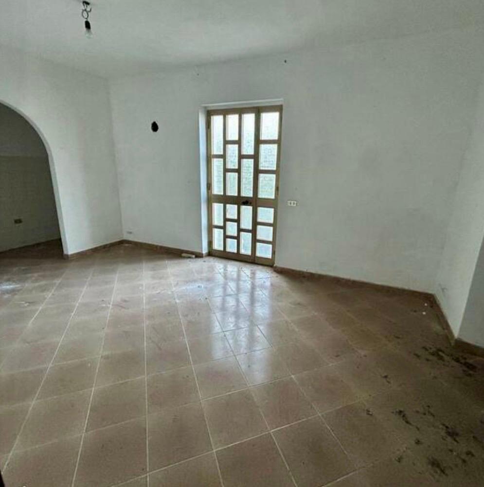 Freehold villa surrounded by greenery.