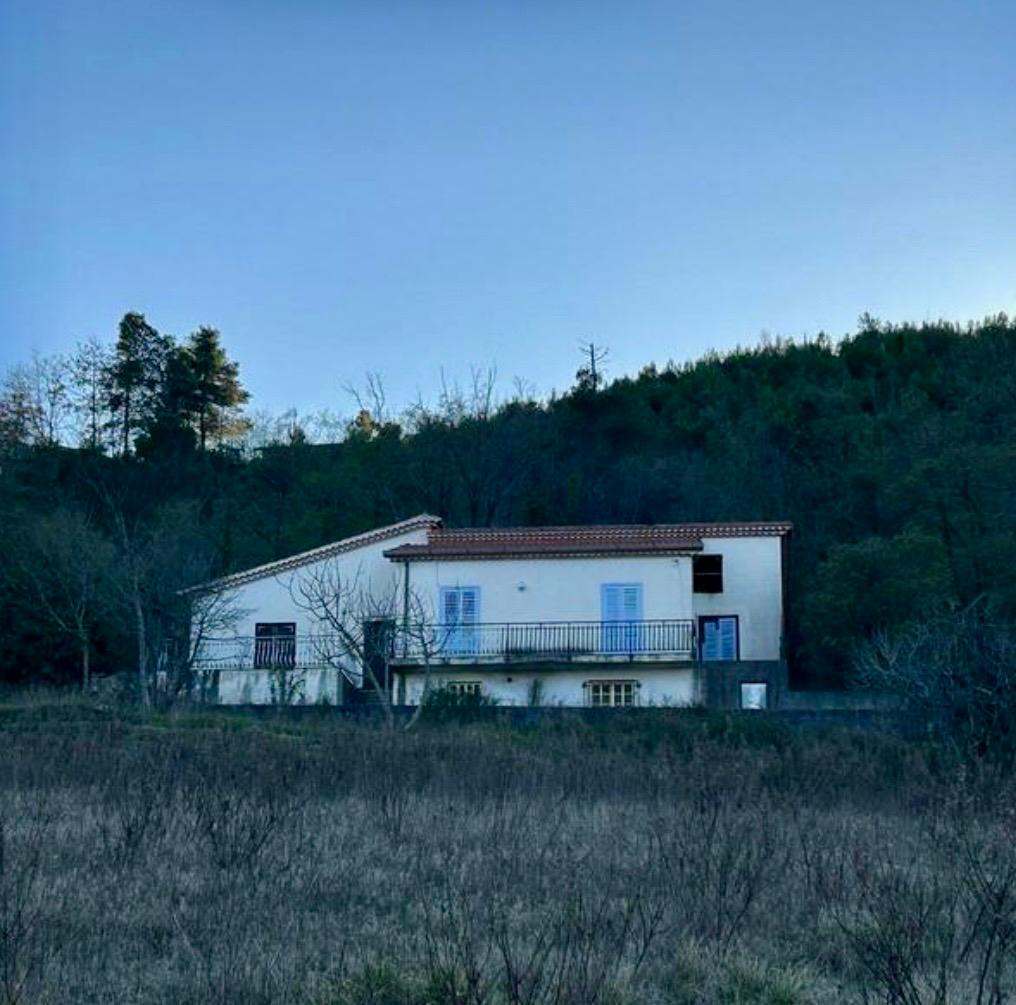 Freehold villa surrounded by greenery.