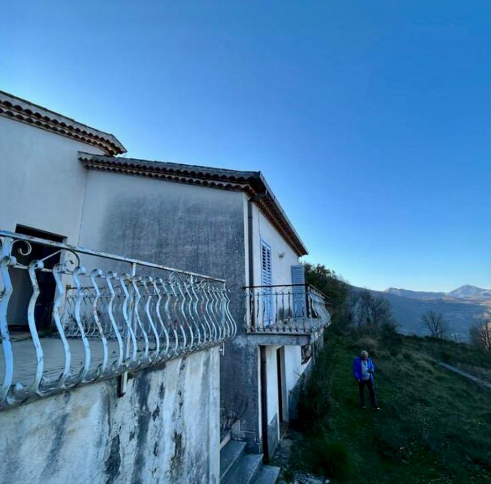 Freehold villa surrounded by greenery.