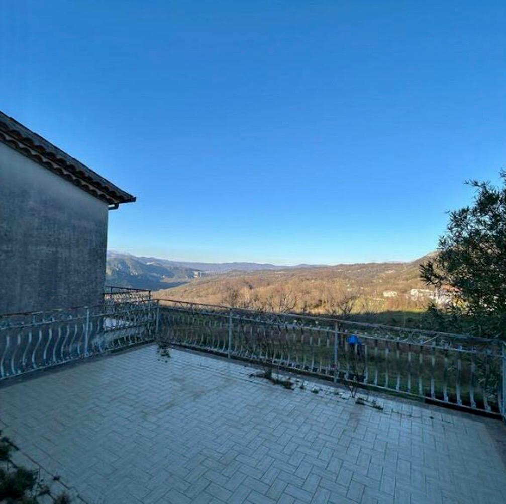 Freehold villa surrounded by greenery.