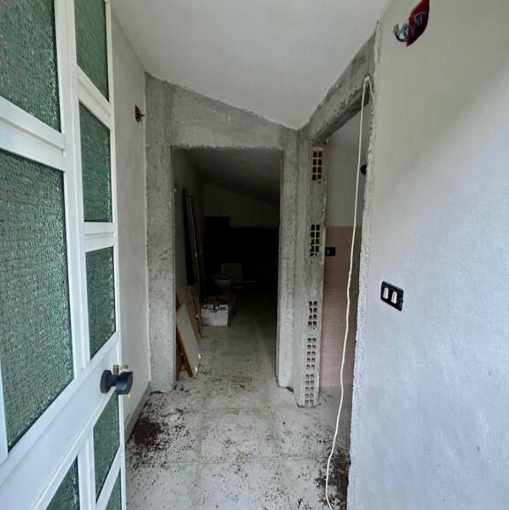 Freehold villa surrounded by greenery.