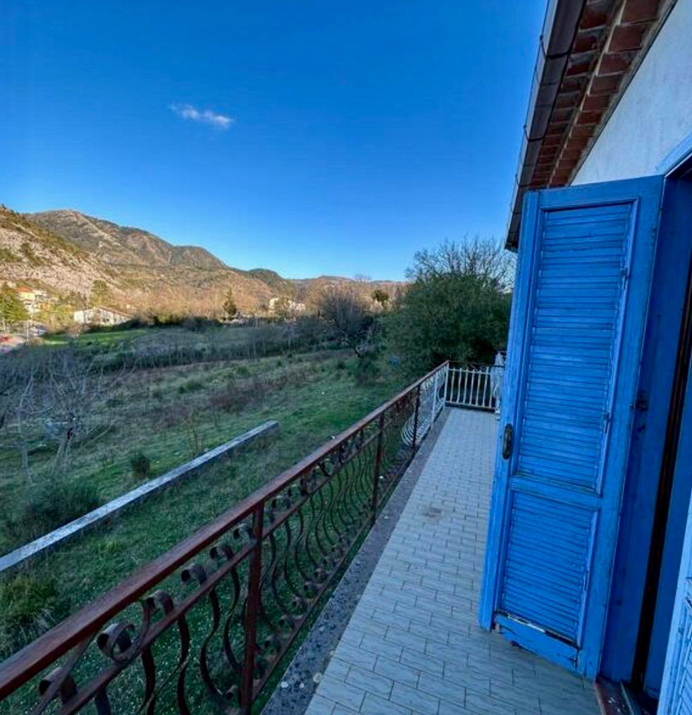 Freehold villa surrounded by greenery.