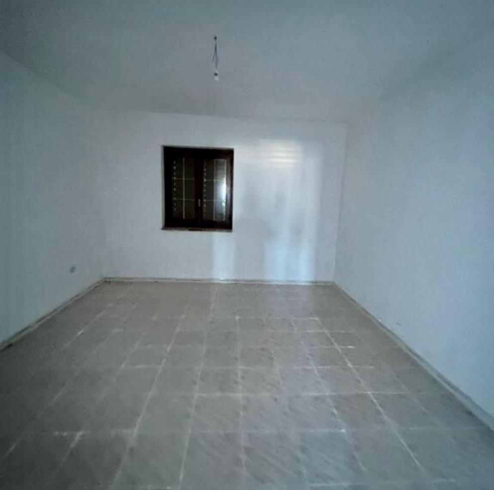 Freehold villa surrounded by greenery.