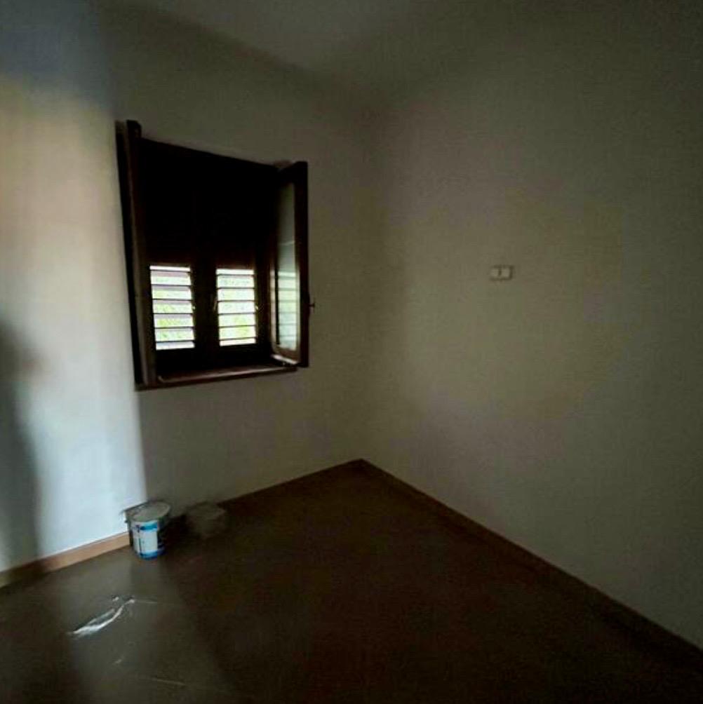 Freehold villa surrounded by greenery.