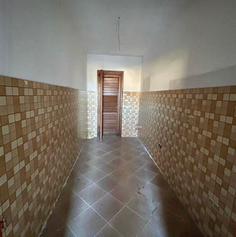 Freehold villa surrounded by greenery.