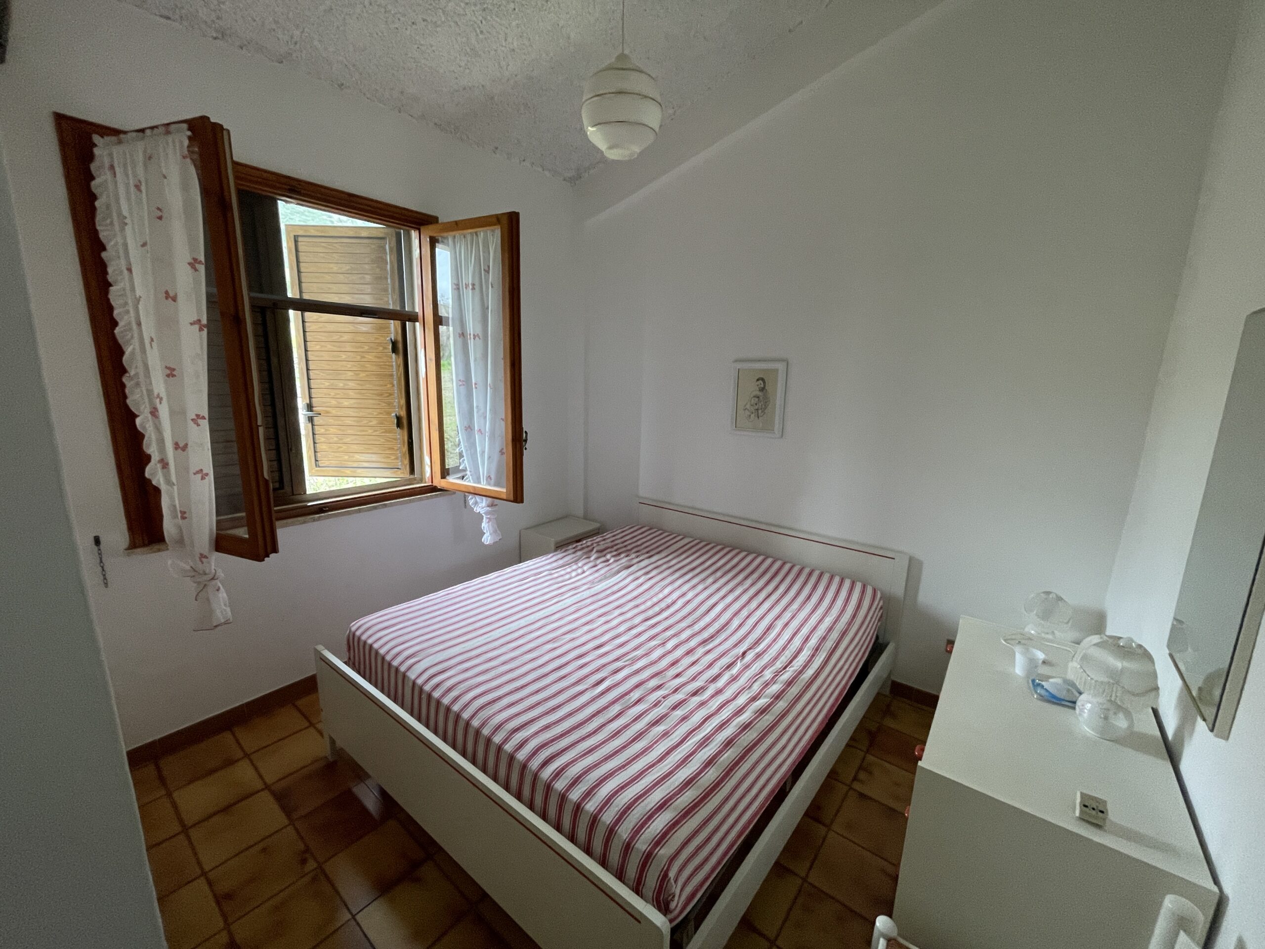 San Lucido housing with nearby airport.