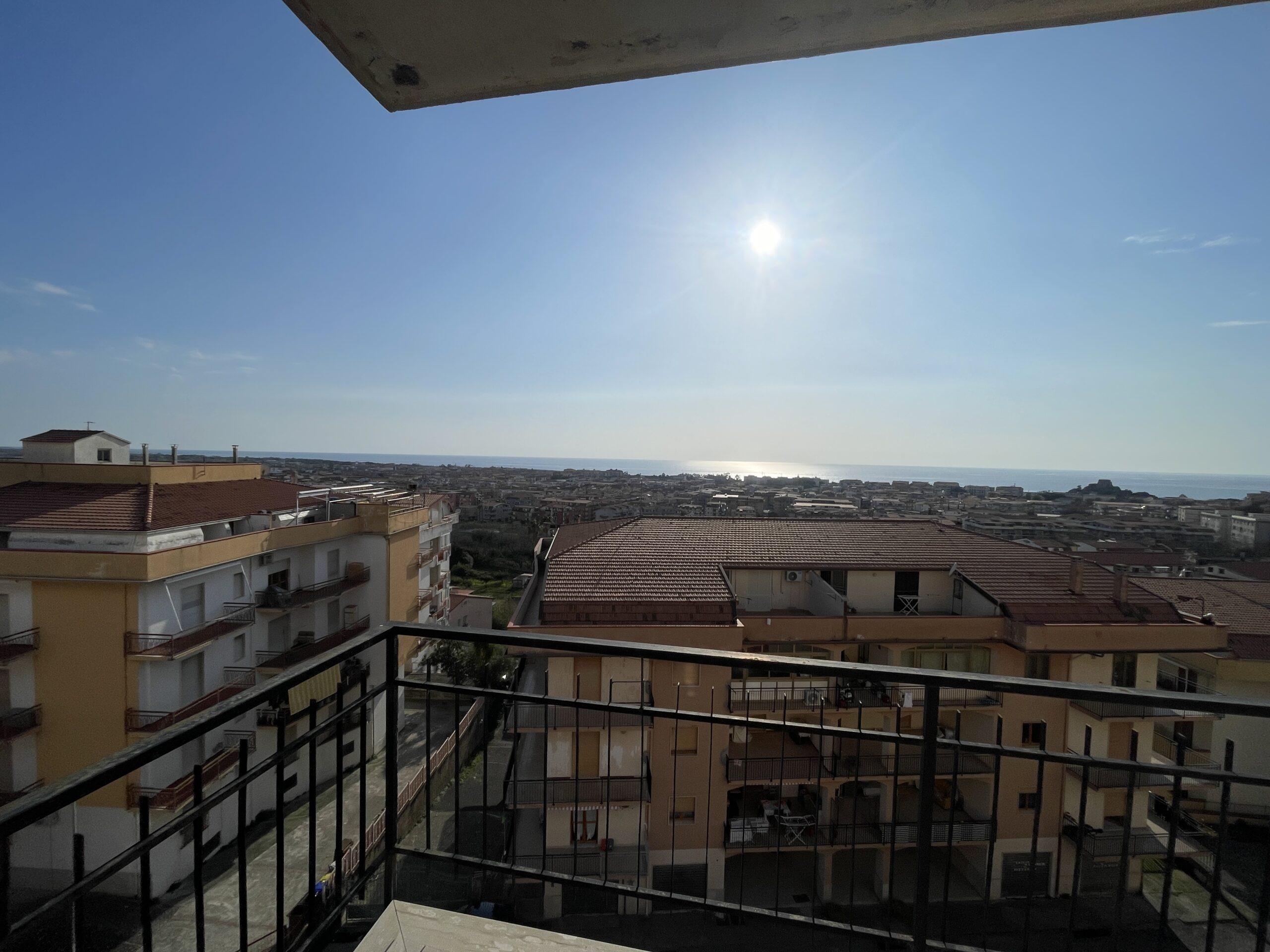A flat with large panoramic balcony.