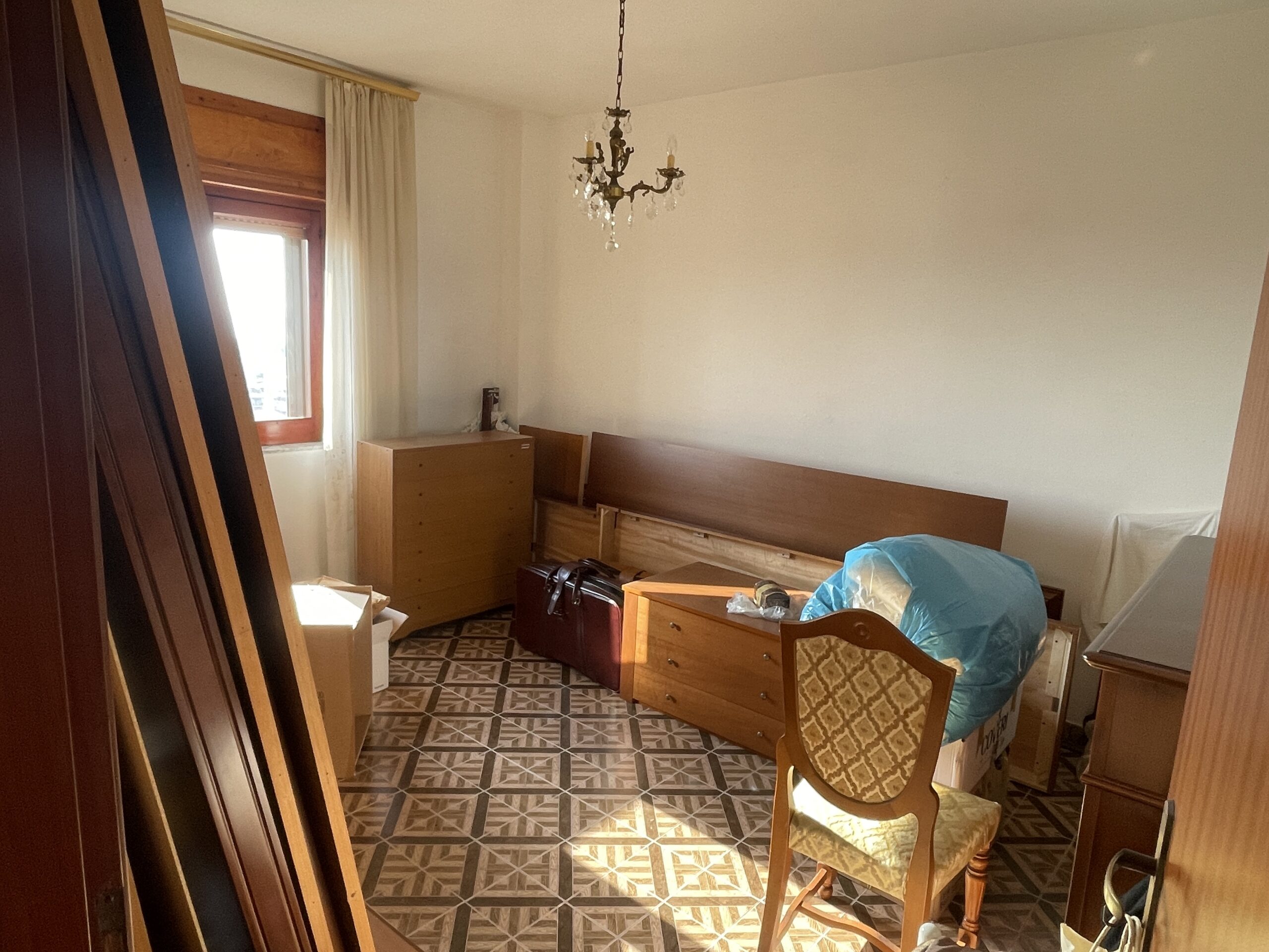 A flat with large panoramic balcony.