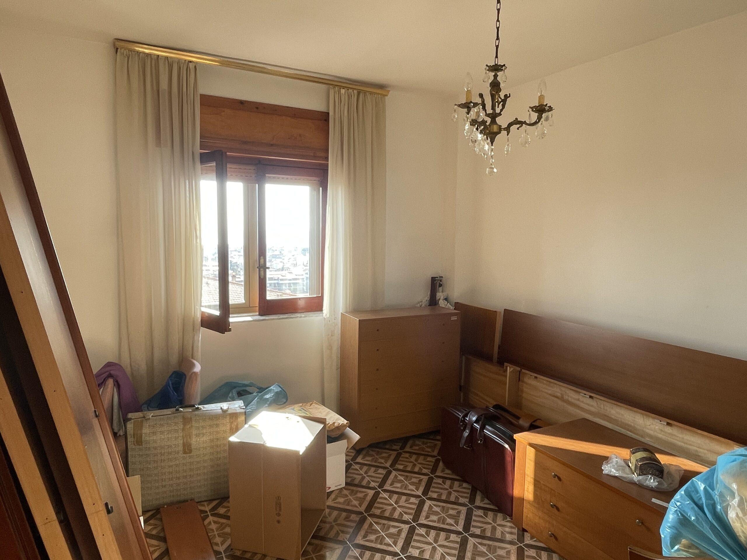 A flat with large panoramic balcony.