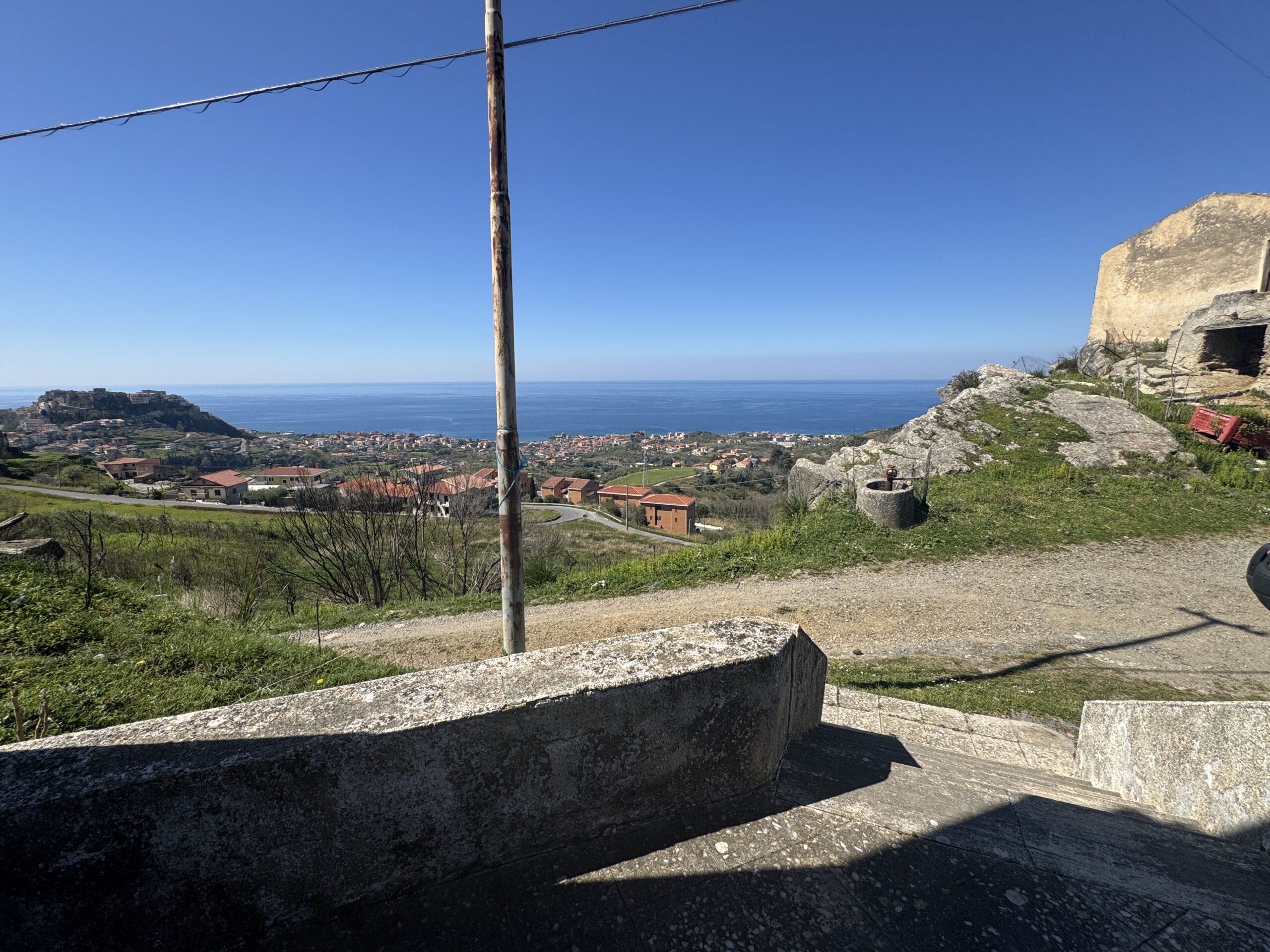 An old debris pit with large grounds and views of the Tyrrhenian Sea.