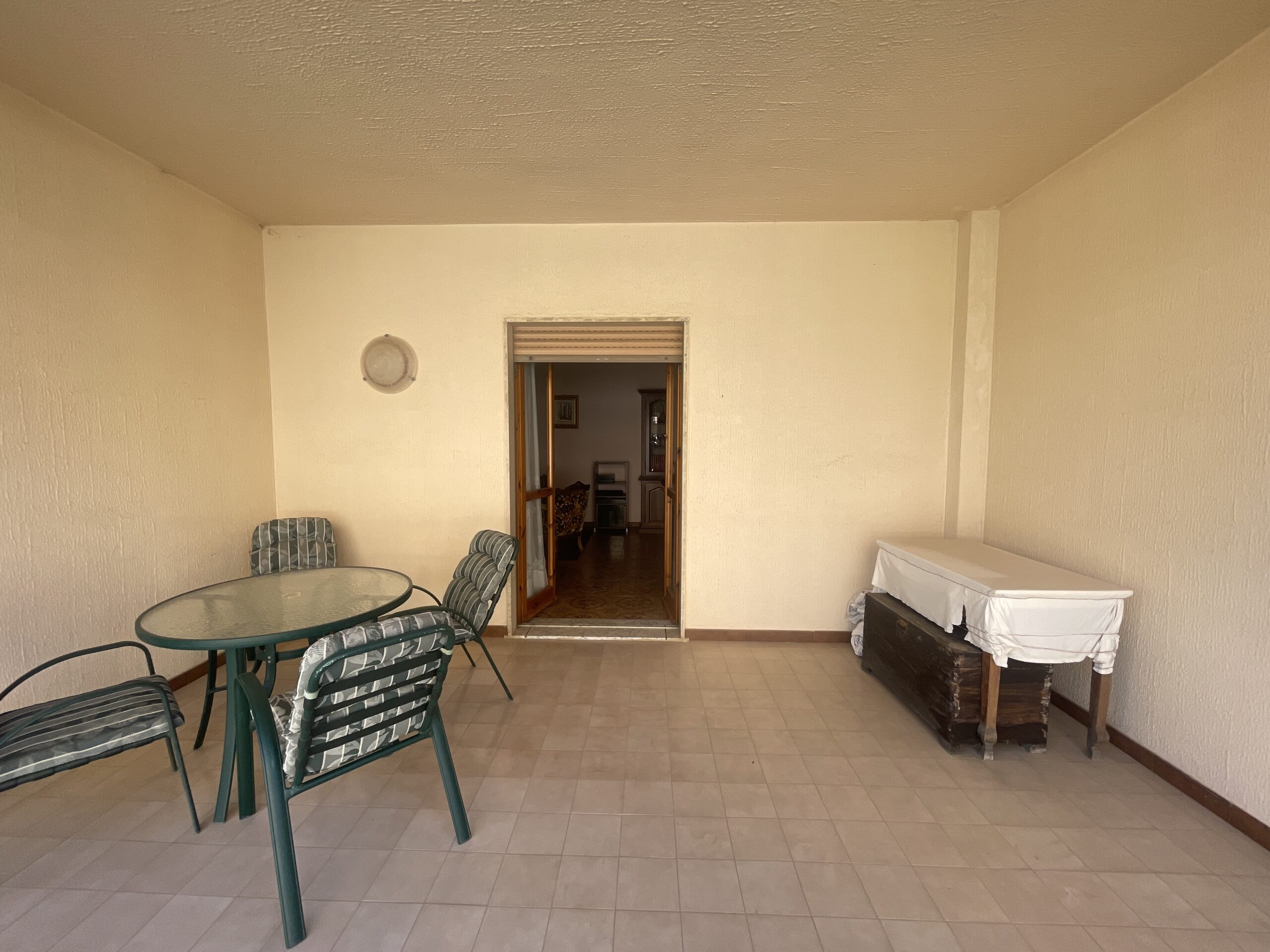 A spacious flat with a balcony overlooking the sea and a large terrace