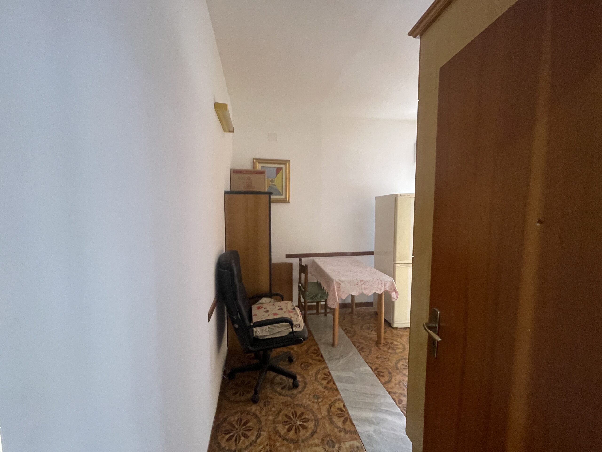 A spacious flat with a balcony overlooking the sea and a large terrace