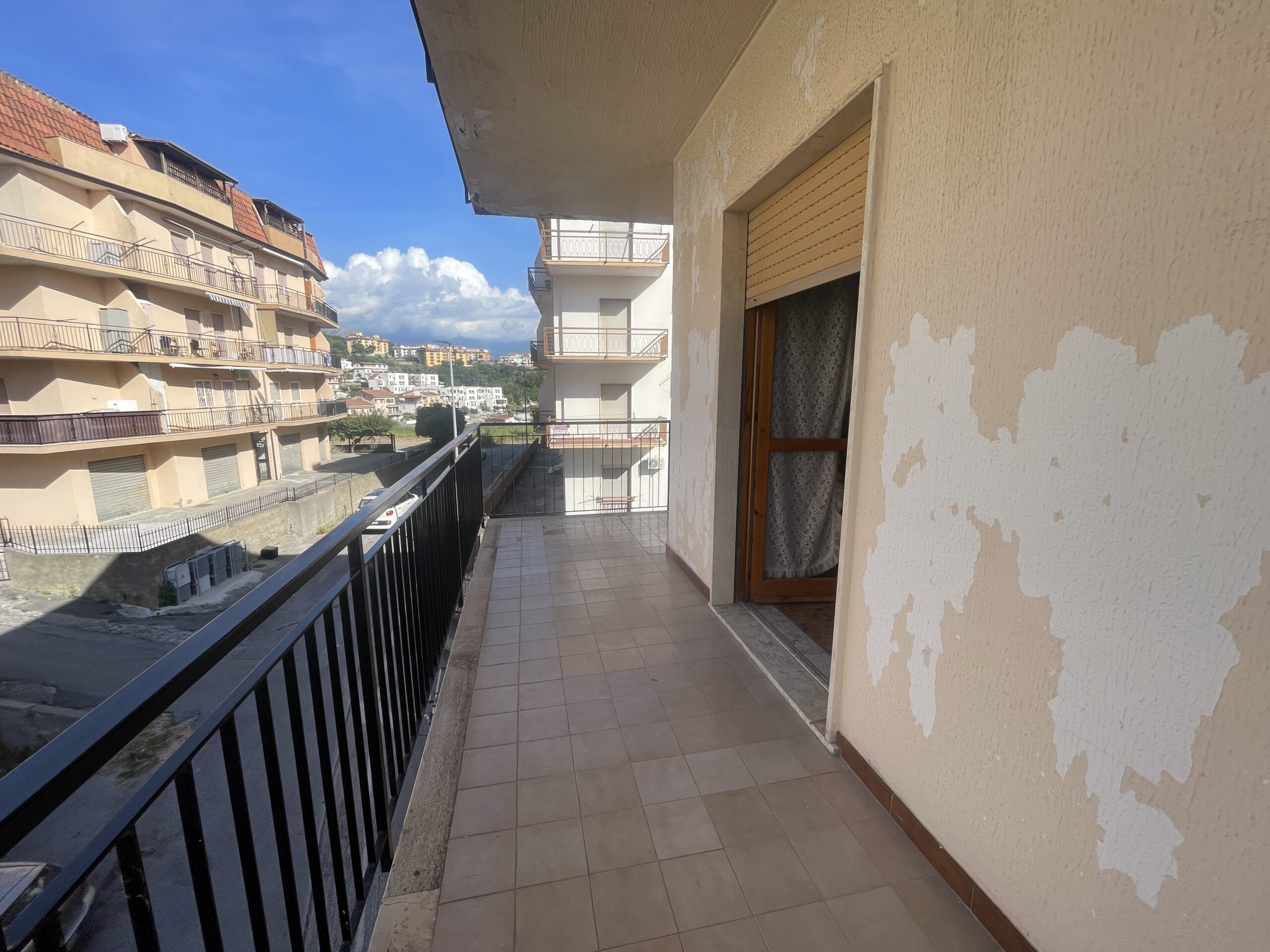 A spacious flat with a balcony overlooking the sea and a large terrace