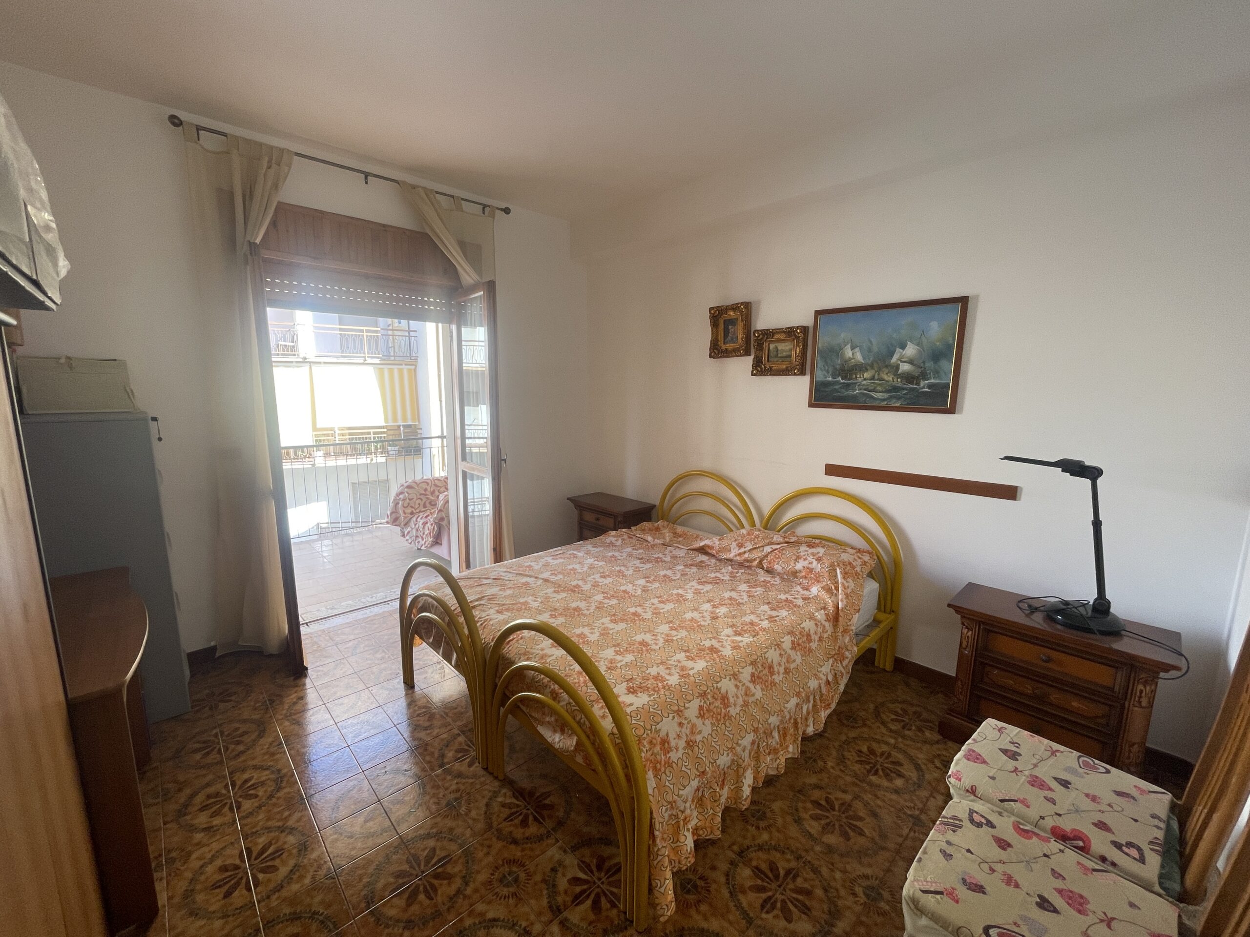 A spacious flat with a balcony overlooking the sea and a large terrace