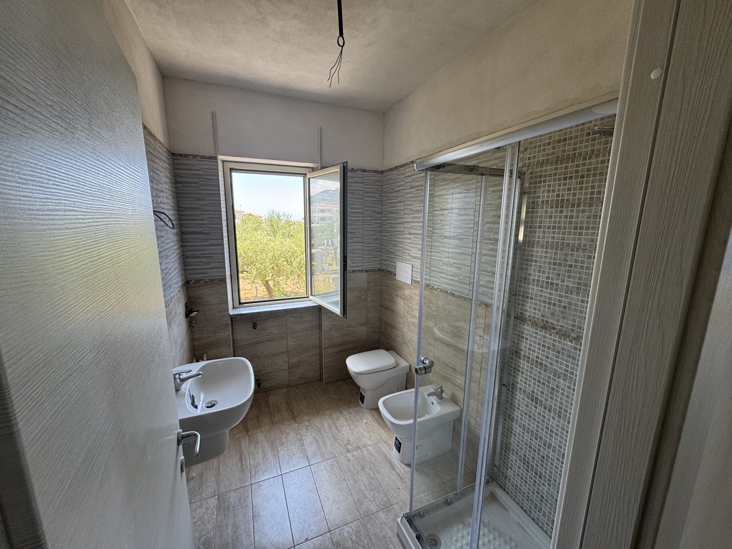 A flat with a view of the Tyrrhenian Sea and the island of Dino